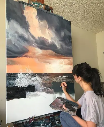 عکس پروفایل نقاش حرفه ای در حال کشیدن دریا 