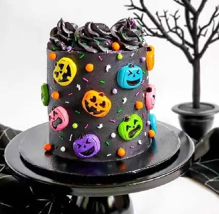 عکس کیک هالووین با تزئین کدو تنبل رنگارنگ