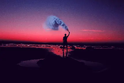 تصویر سیلوئت ساحل در غروب با آسمان صورتی و کیفیت بالا