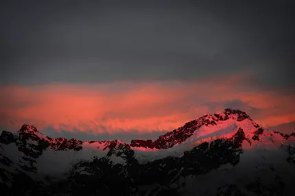 خرید تابلو شاسی منظره غروب آفتاب در کوهستان با آسمان قرمز