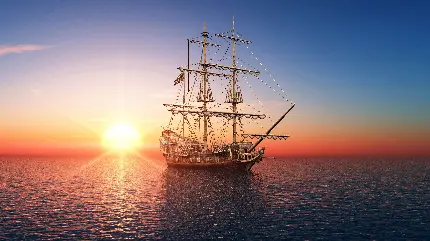 تابلو دیواری قایق بادبانی در غروب دریا