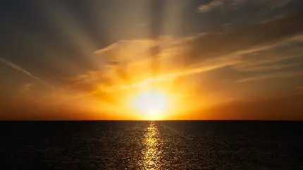 عکس از طلوع آفتاب در ساحل و دریای آرام با کیفیت بالا