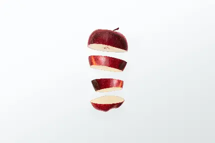 بک گراند شیک و خاص سیب سرخ تکه تکه شده با بهترین کیفیت