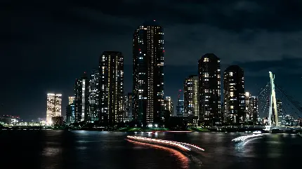 تصویر زمینه از شب با ساختمان های بلند ، زیبا و نورانی 