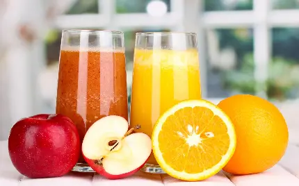 پس زمینه آب پرتقال و آب سیب برای علاقه مندان به این دو میوه 