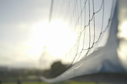 تصویر زمینه تور والیبال در طلوع زیبای آفتاب با کیفیت HD