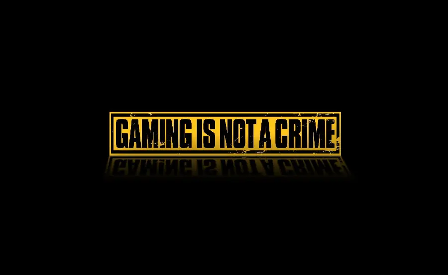 پس زمینه شیک مشکی برای ویندوز با تیتر Gaming Is Not A Crime 