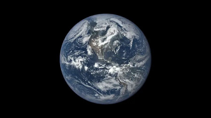 عکس و تصویر استوک کره زمین با رنگهای سرمه ای و سفید از ناسا