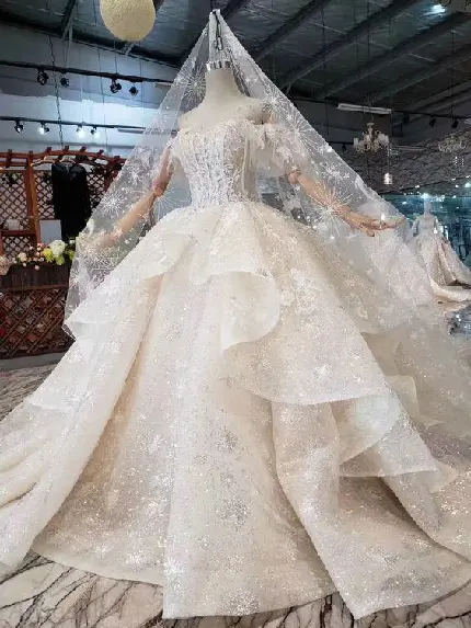 عکس زیبا و جالب لباس عروس با تور خوشگل و بلند با کیفیت HD