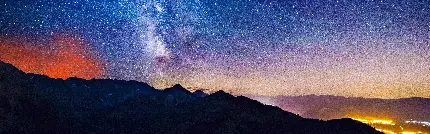 تصویر آسمان با میلیون ها ستاره برای بک گراند مانیتور عریض