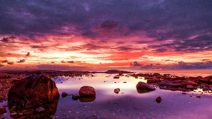 دانلود عکس با کیفیت 11K غروب آفتاب و ساحل سنگی