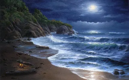 والپیپر ویندوز بسیار زیبا از امواج اقیانوس در شب زیر نور ماه و با آتش روشن در ساحل با کیفیت HD