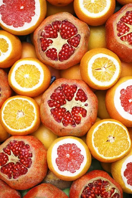 عکس زیبا میوه پرتقال در کنار میوه انار با کیفیت خیلی عالی