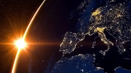دانلود عکس جادویی کره زمین با زمینه تابش شدید خورشید با کیفیت اچ دی