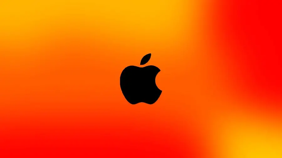 پس زمینە خاص لپ‌تاب اپل از سیب گاز گرفتە مشکی رنگ باکیفیت hd با زمینە نارنجی و قرمز و زرد روشن