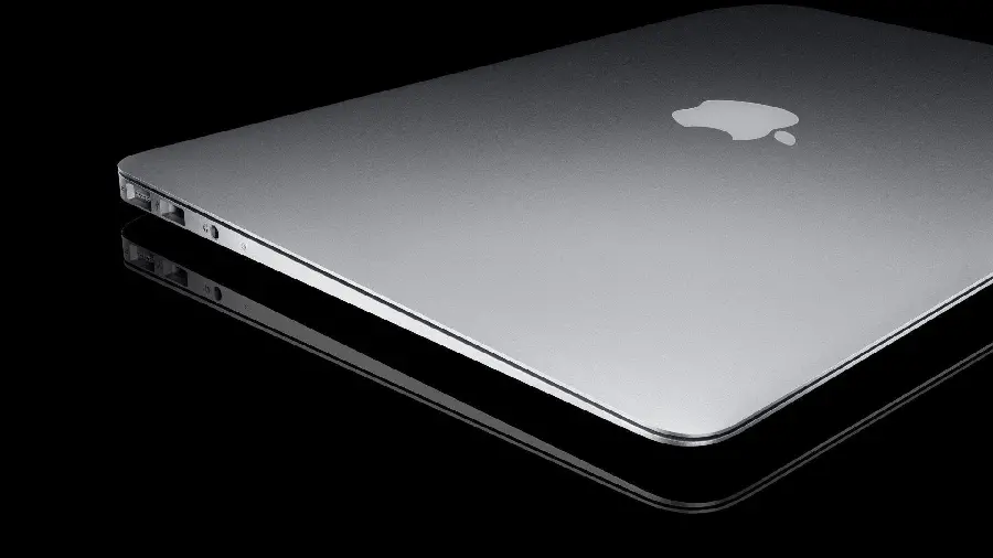 جدیدترین تصویر مشهور از لوگوی سیب گاز گرفتە روی لپ‌تاب اپل خاص والپیپر باکیفیت hd