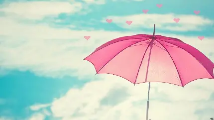 تصویر زمینه صورتی کیوت با طرح چتر و آسمان
