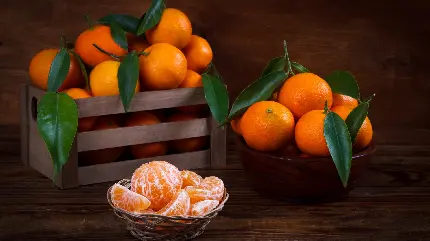 عکس میوه های پرتقال داخل سبد روی میز