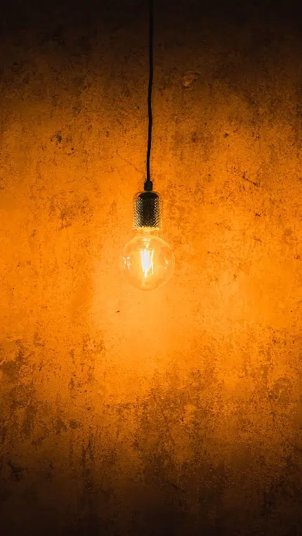 تصویر هنری جادویی از لامپ روشن با زمینه دیوار 8k