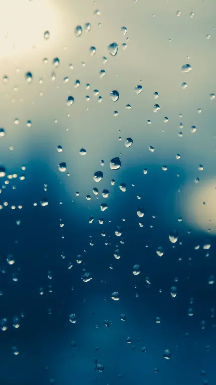 عکس زیبا مناسب تصویر زمینه آیفون از قطره های باران روی شیشه