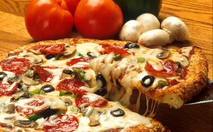 تصویر Full HD از پیتزا مکزیکی پر پنیر لذیذ برای پیج فست فود