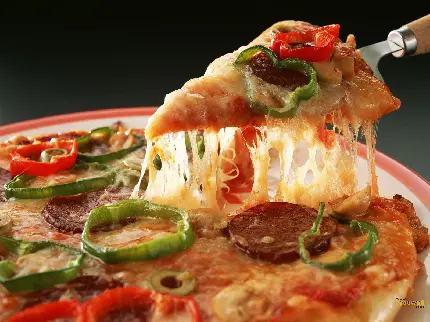 بک گراند جالب از پیتزا سبزیجات خوش رنگ و لعاب برای لپتاپ