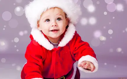 بک گراند نوزاد در لباس کریسمس با کیفیت 4k مخصوص زمینه