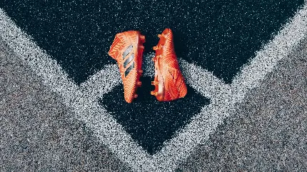 تصویر جديد از کفش فوتبال به رنگ قرمز جذاب با کیفیت Full HD 