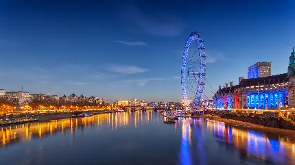 عالی‌ترین پس زمینه از چرخ و فلک بسیار زیبای شهر لندن در شب‌ باکیفیت فول