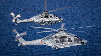 تصویر والپیپر 4k دو هلیکوپتر در حال پرواز بر دریای بیکران خاص لپ‌تاب