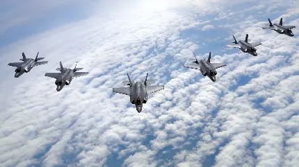  بک گراند از پرواز هواپیما های جنگی قدرتمند بر فراز آسمان ابری 