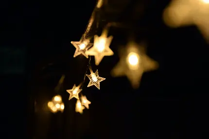 تصویر ریسه ستاره ای تابان در شب مناسب زمینه متن تبریک خاص