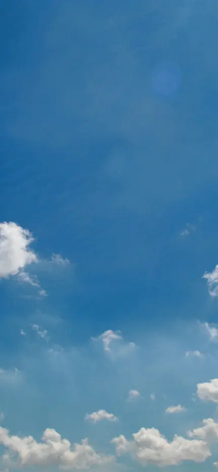 دانلود عکس استوک باب روز از آسمان آبی رنگ با ابر کوچک باکیفیت اچ دی