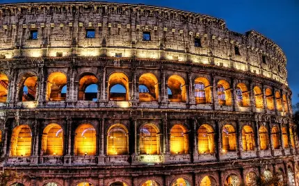 عکس پروفایل محبوب‌ترین بنای تاریخی امپراتوری رم کولوسئوم با چراغ‌های روشنش