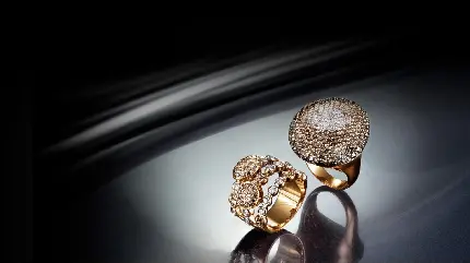 دانلود عکس دلپذیر 2 انگشتر الماس طلایی مناسب واتساپ باکیفیت عالی