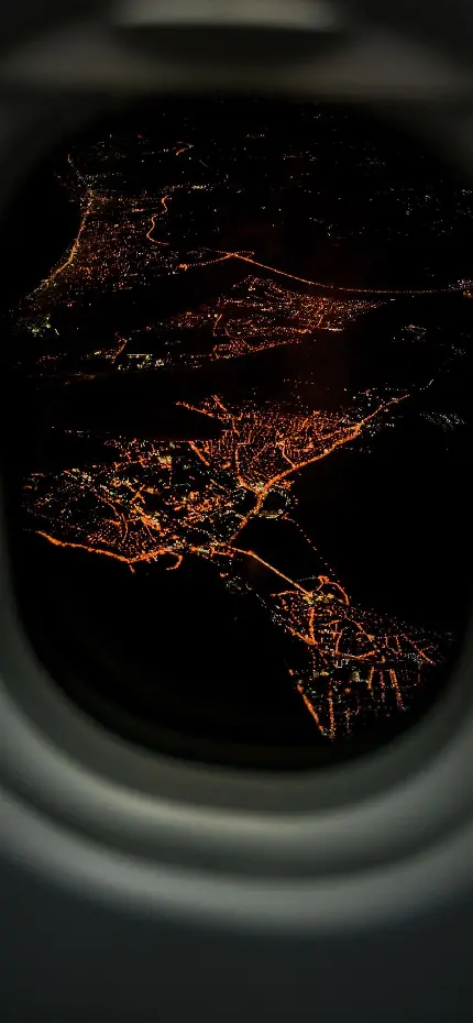 دانلود عکس دیدنی از منظره شب در پنجره هواپیما با کیفیت عالی