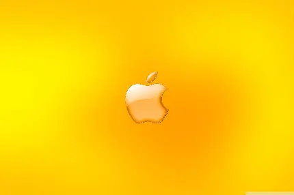 والپیپر مخصوص آی پد اپل با سیب گاز گرفتە درخشان و رنگ‌های هلویی و زرد پیرامونش