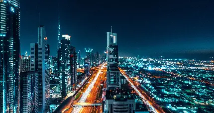 بک گراند رویایی شهر پیشرفته دبی در شب برای دسکتاپ
