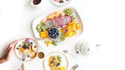 عکس صبحانه مقوی با انواع میوه های خوشمزه استوایی