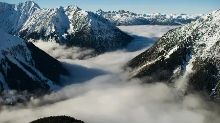 استوری خوشگل کوهستان برفی میان ابرها مناسب instagram 