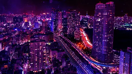 تصویر هوایی چراغانی از شهر پیشرفته با آسمان بنفش 