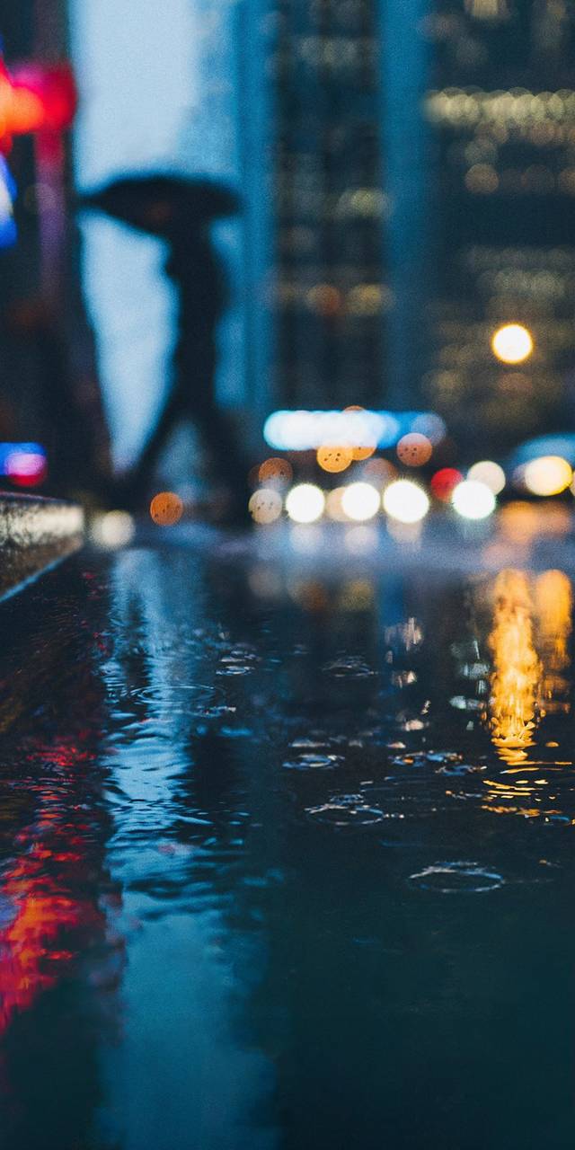 تصویر زمینه رویایی شهر بارانی در شب برای استوری و زمینه گوشی