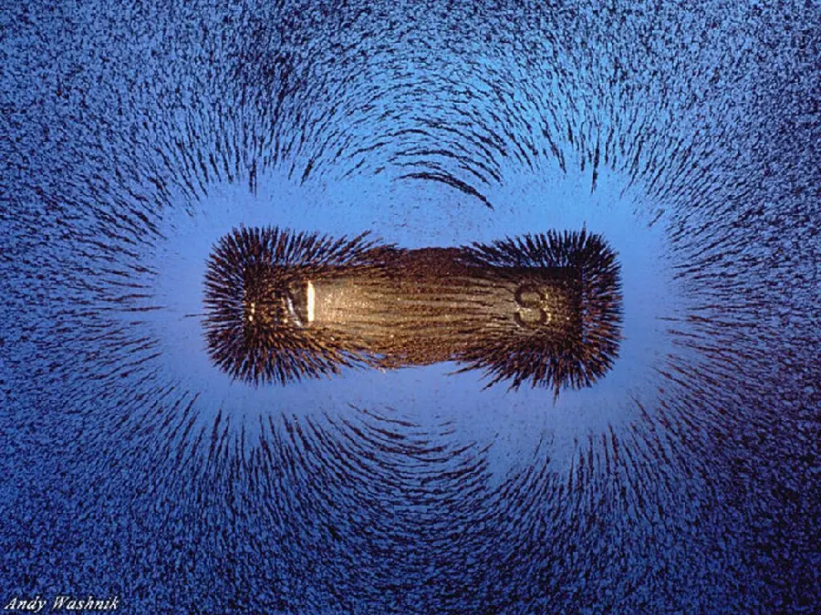 عکس جهت گیری براده های آهن در میدان مغناطیسی