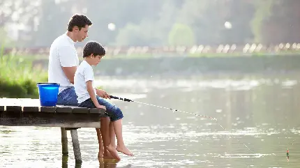 دانلود پروفایل زیبا و تماشایی پسری که کنار پدرش ماهی گیری میکند