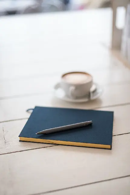 بک گراند فنجان قهوه و دفتر و خودکار با کیفیت بالا مخصوص گوشی