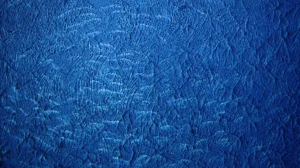 والپیپر جذاب از دیوار رنگ شده با رنگ آبی با پترن موج های کوچک
