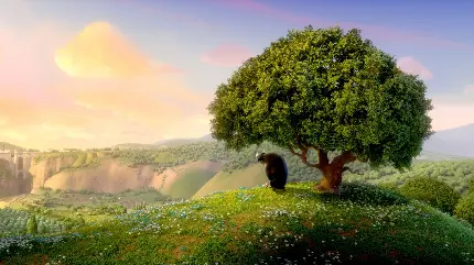 عکس دلپذیر و کارتونی گاو مشکی تنها زیر درخت سبز در طبیعت بهشتی فصل بهار