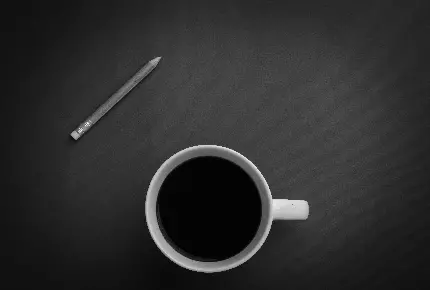 عکس استوک فنجان قهوه در زمینه خاکستری با کیفیت بسیار بالا
