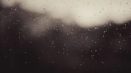 تصویر زمینه خاص شیشه مات خیس شده با قطرات باران برای لپ تاپ