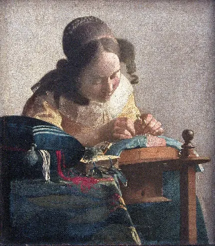 نقاشی زن جوان مشغول به کار از یوهانس فرمیر نقاش مشهور هلندی 